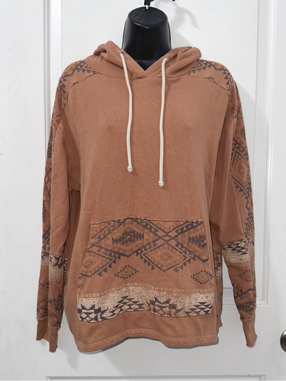 BKE pullover hoodie with a tribal pattern on the sleeves and front pocket